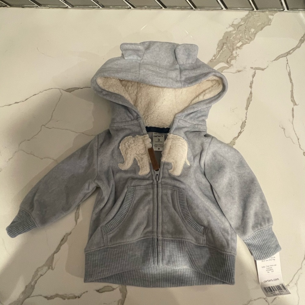 Carter Boyd’s fleece jacket, light blue